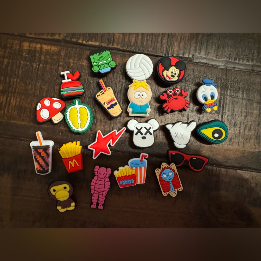 Random Pack of 21 Crocs Jibbitz. Mickey Mouse, Donald Duck, French fries.